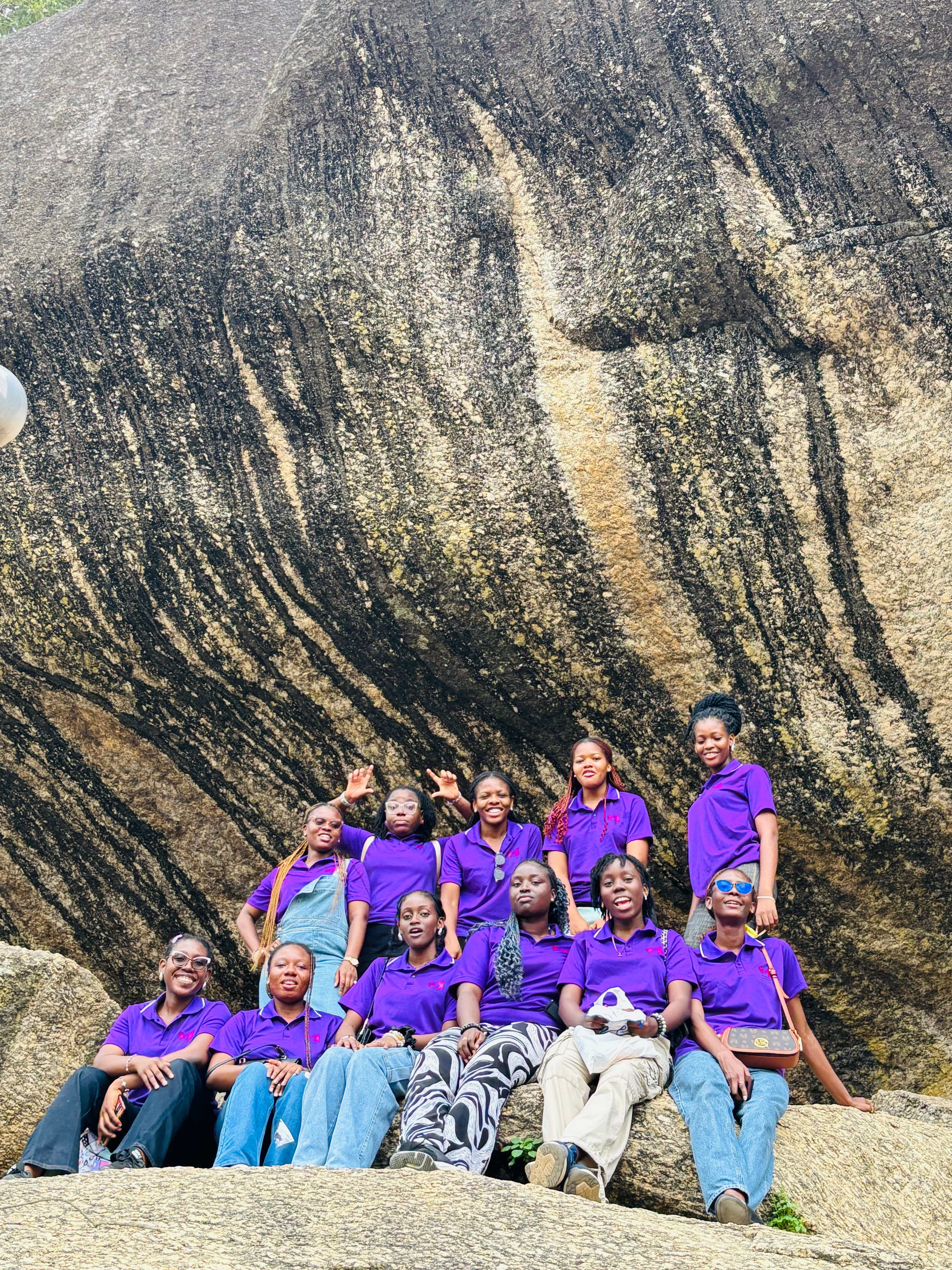 Volunteers with campers at the rocks